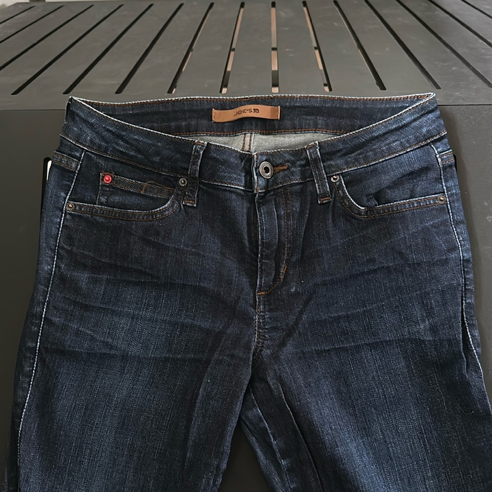 Joe’s Honey Skinny (curvy skinny) dark denim jean. Size 29.